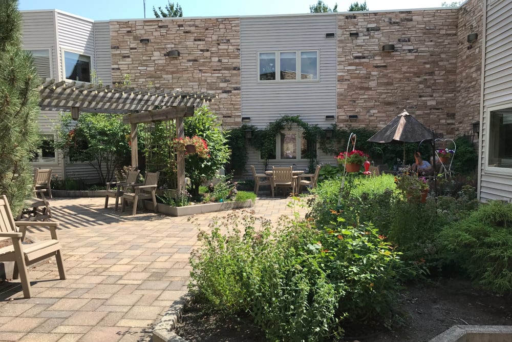 Courtyard and view of apartment buildings at Prairie Hills Cedar Rapids in Cedar Rapids, Iowa.
