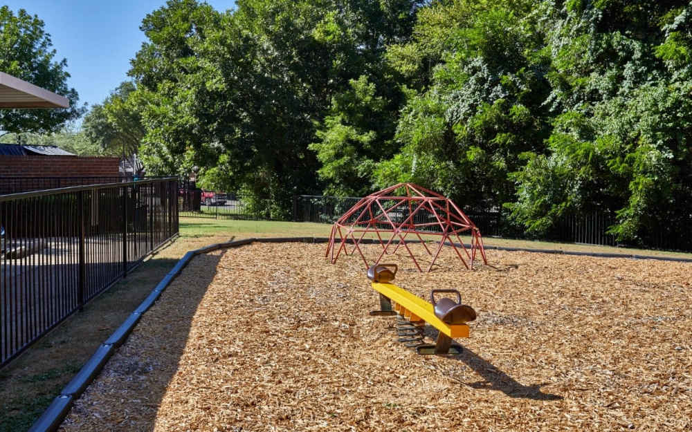 Outdoor playground at Creekwood Place in Lancaster, Texas