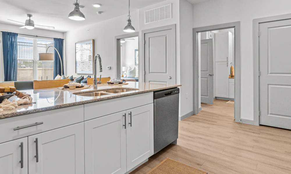 Breakfast counter with white cabinets at Main and Mill in Lewisville,Texas