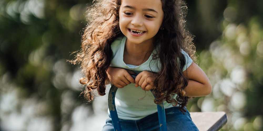 A happy kid at Clear Creek Crossing in Wheat Ridge,Colorado