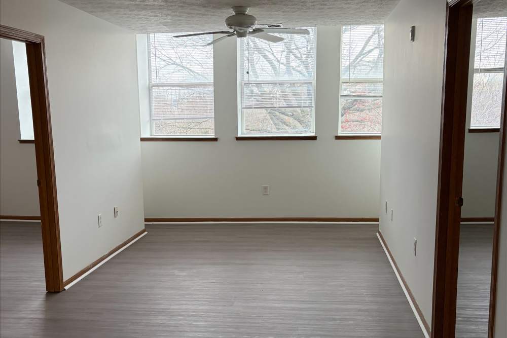 Living room with ceiling fan at Stetson Senior Apartments in Indianapolis, Indiana