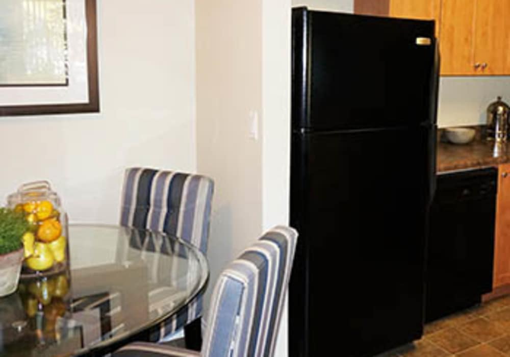 Refrigerator at UCE Apartment Homes in Fullerton, California  