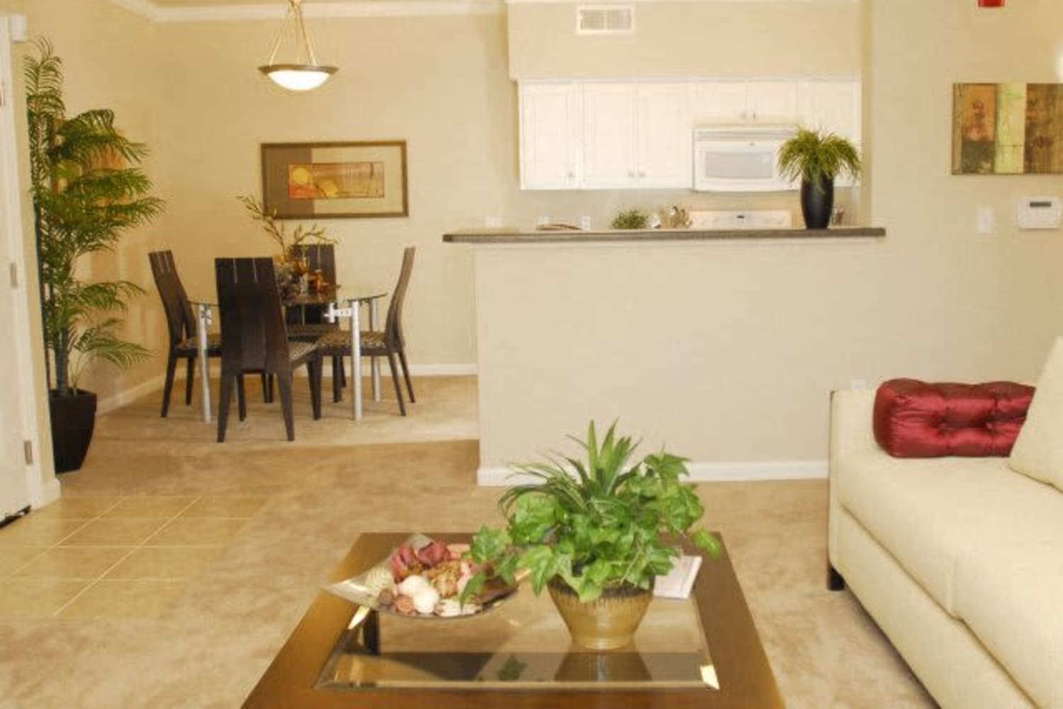 Living room with carpet at Villas At Villaggio in Modesto, California