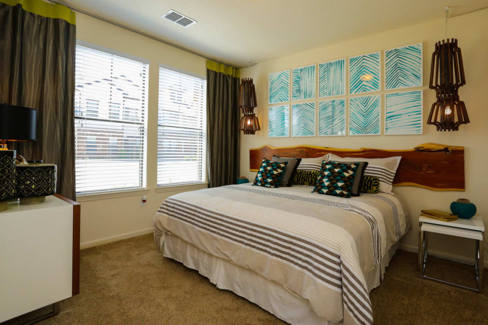 Draped windows in a model home's bedroom at The Hawthorne in Jacksonville, Florida