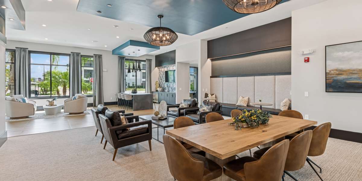 Spacious resident clubhouse with dining and lounge seating at Savelle Nona West near Lake Nona.