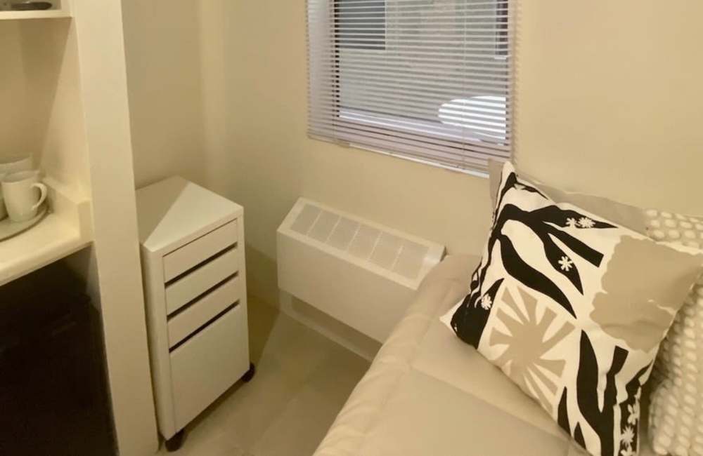 Comfortable bedroom at Trolley Court in San Diego, California 