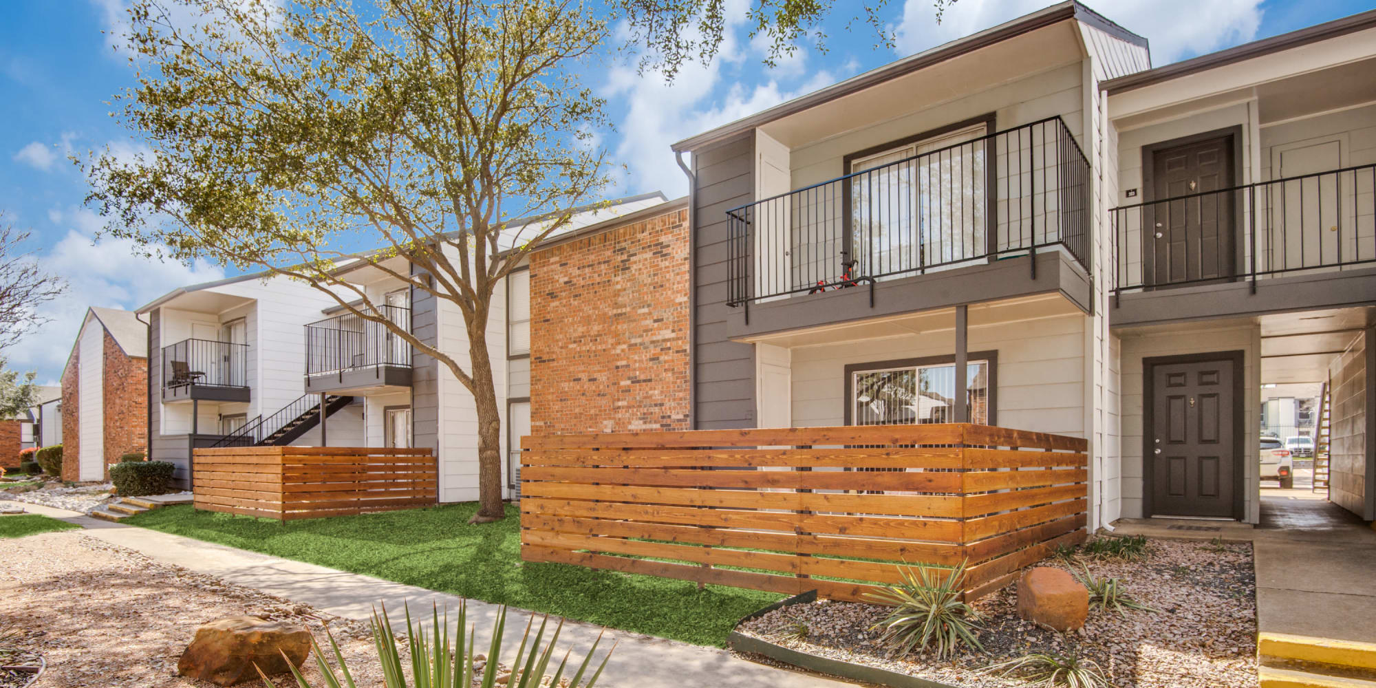 Exterior of homes at Holbrook Apartment Homes in Dallas, Texas