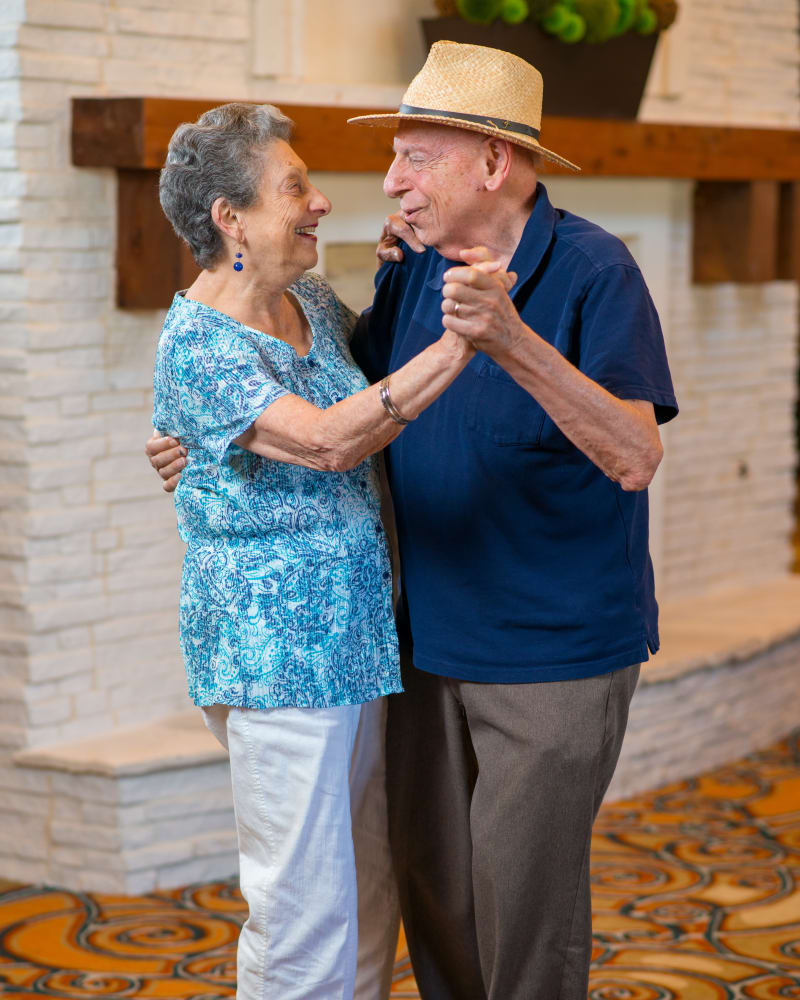 Resident couple dancing at Watermere at the Preserve in North Richland Hills, Texas