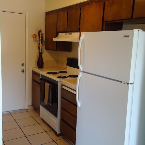 A model home's kitchen at Olympus Court Apartments in Bakersfield, California