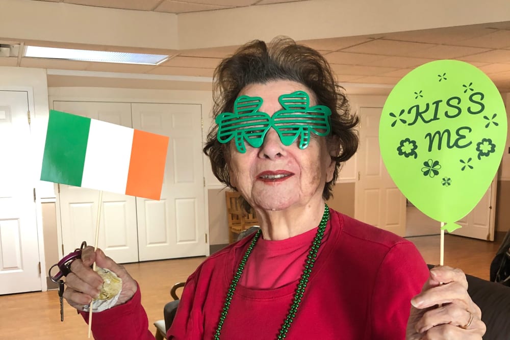 Resident celebrating st patrick's day at Traditions of Cross Keys in Glassboro, New Jersey