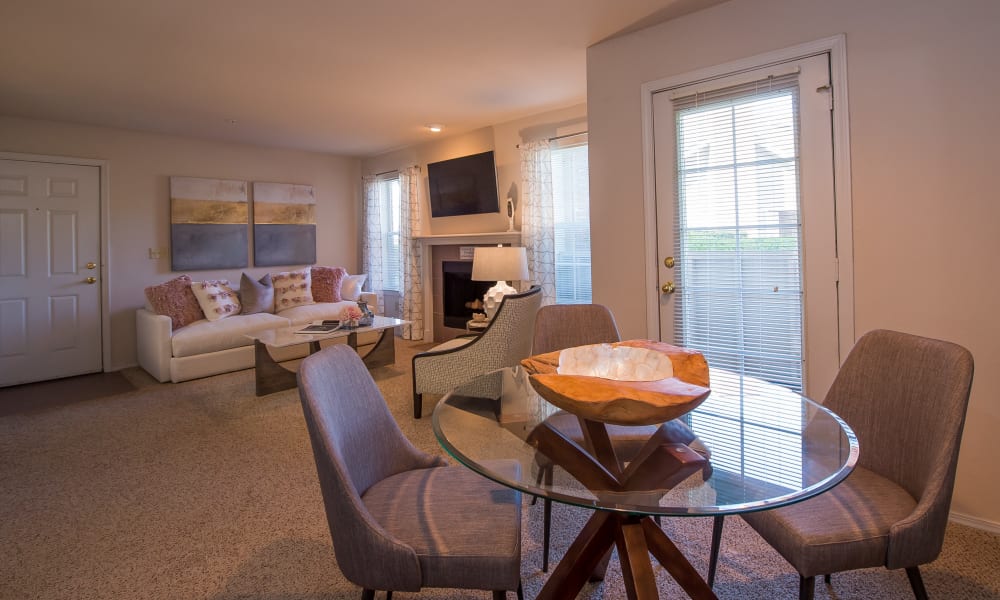 Dining area and living room at Newport Wichita in Wichita, Kansas