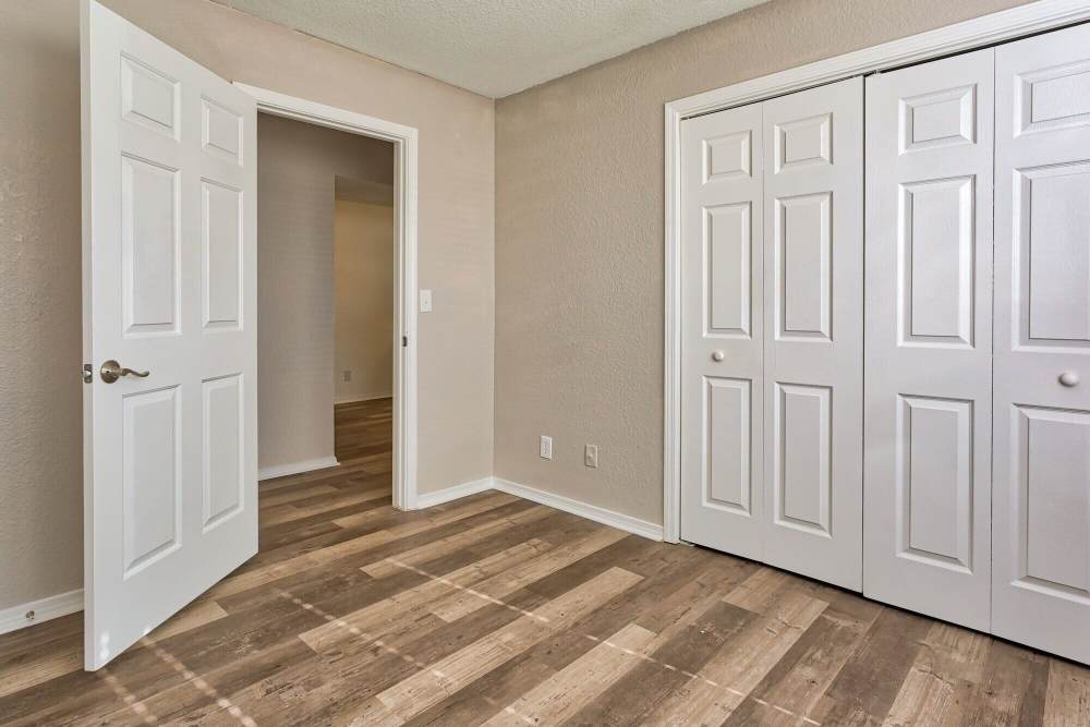 Bedroom with walk-in closets at The Gardens At Duncan Apartments in Duncan, Oklahoma