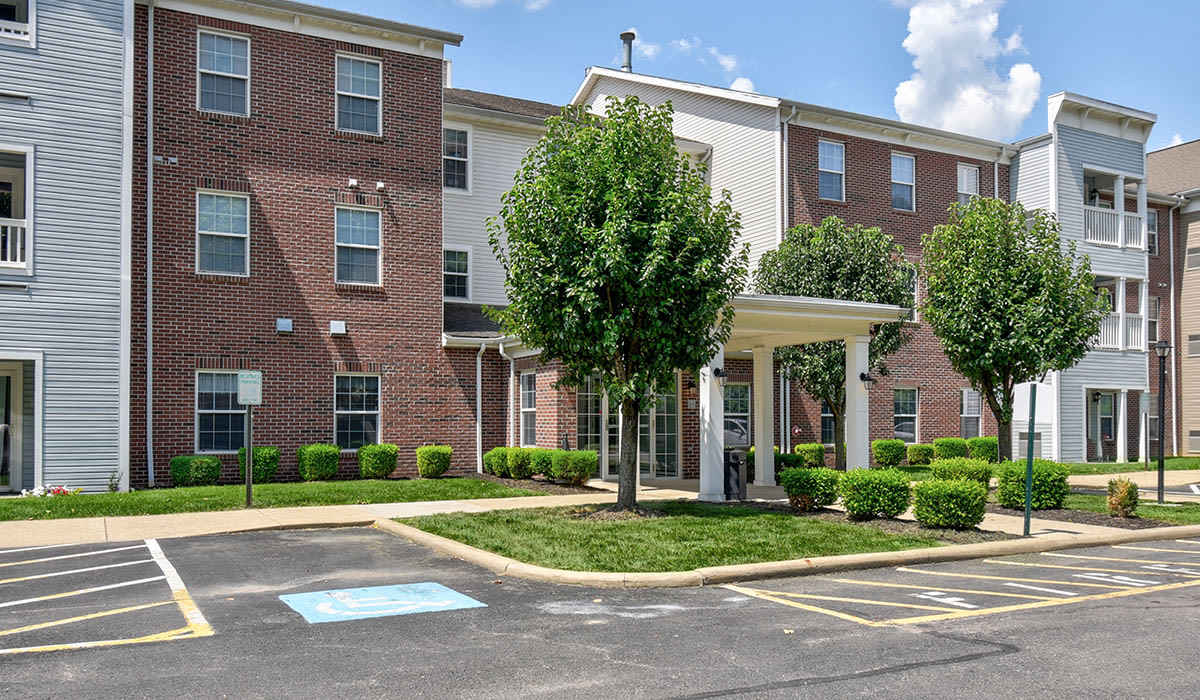 Exterior of modern building with car parking facility at frontside at Providence Greene II in Wheeling, West Virginia