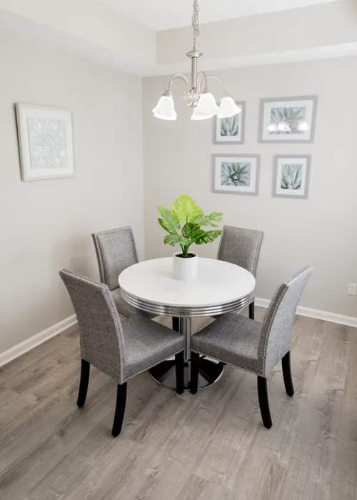 Dining space with carpeted floor at Colts Run in Lexington, Kentucky