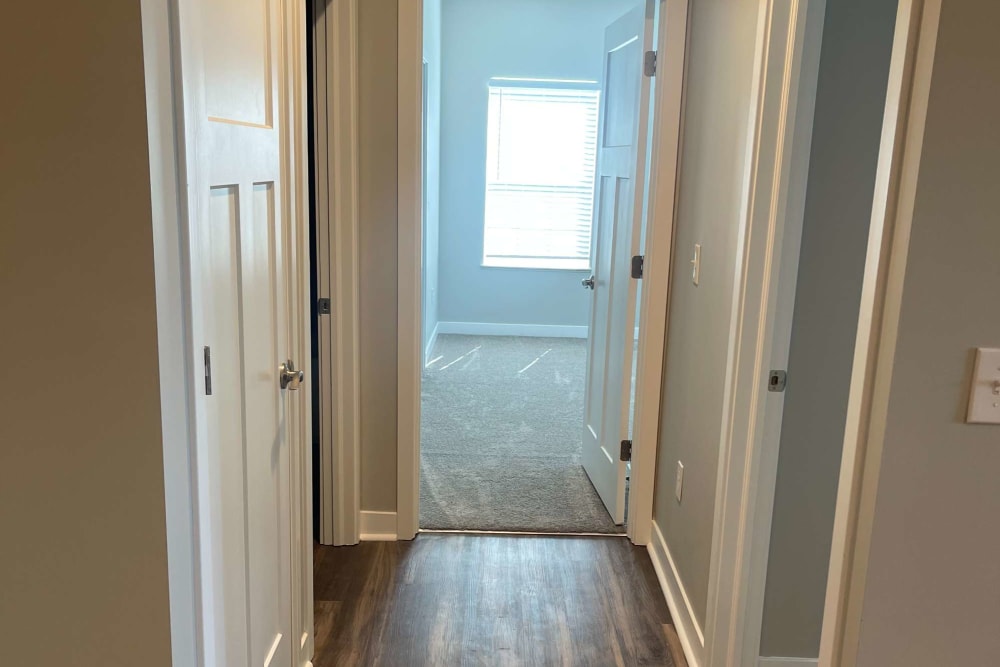 Apartment hallway to bedrooms at Meridian Oaks Apartments in Greenwood, Indiana