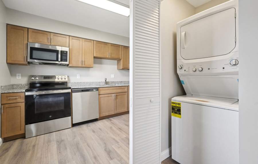 View of kitchen from laundry room at Charleston Square Apartments in Columbus, Indiana