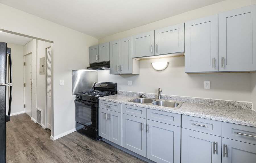 Kitchen room with modern appliances at Pin Oak Manor Apartments in Mishawaka, Indiana