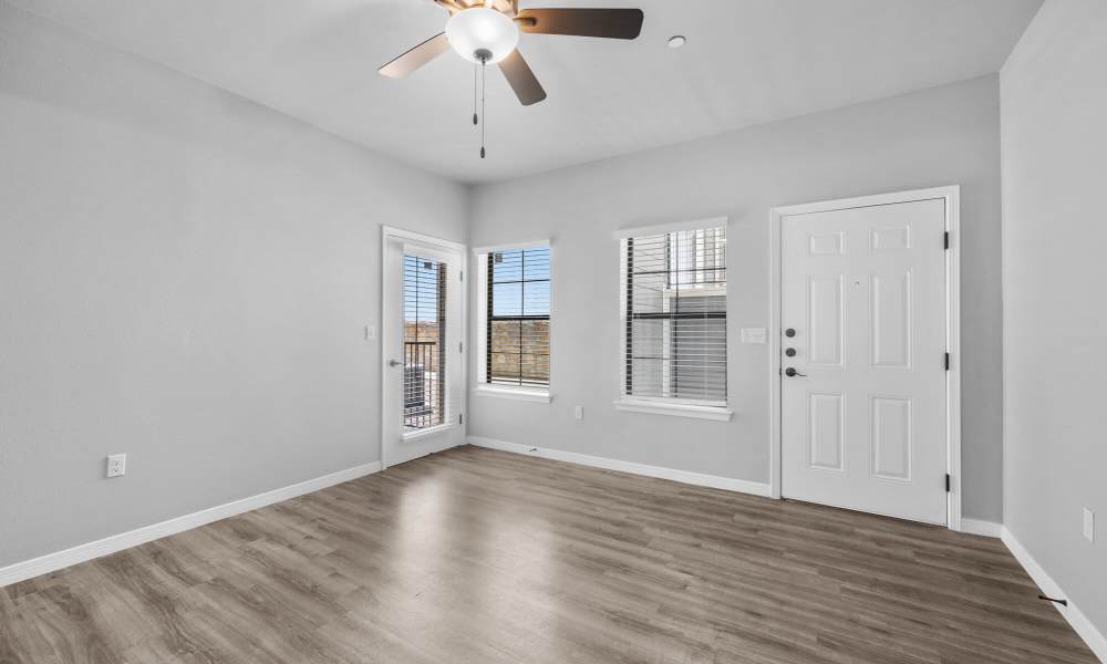 Living room with attached patio at District At Pellicano in El Paso, Texas