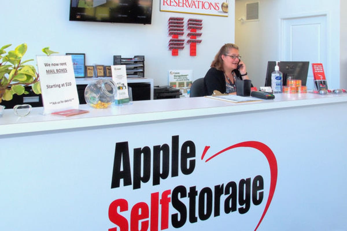Hands together in support of our mission at Apple Self Storage, to earn your business in every market we serve