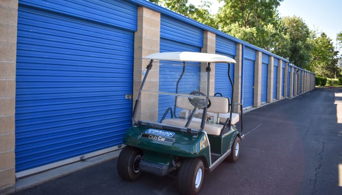 A golf cart in front of exterior storage units at STOR-N-LOCK Self Storage in Boise, Idaho