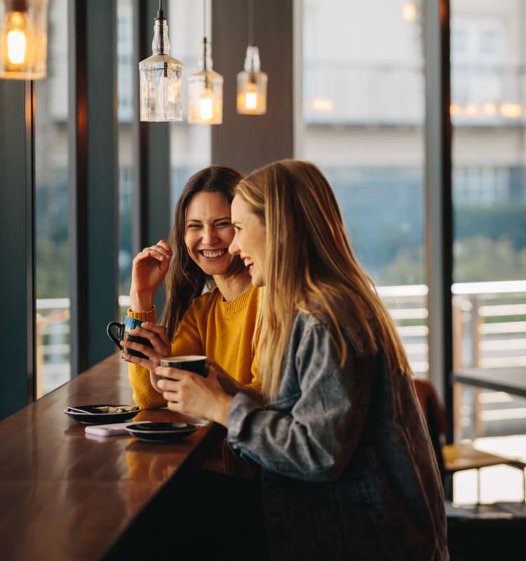 Residents enjoying a drink at a cafe near Executive Apartments in Miami Lakes, Florida