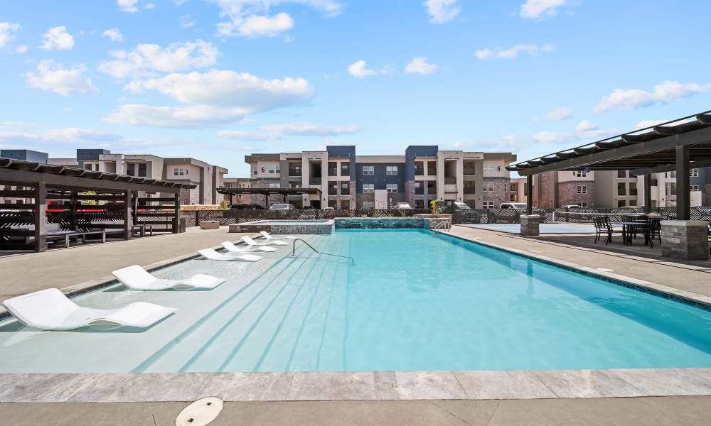 Sparkling pool water with sun decks at Retreat at Eastlake in El Paso, Texas