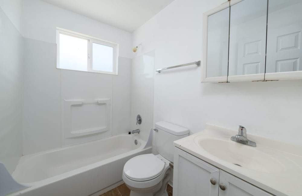 Bathroom with bathtub at Twin oak apartments 