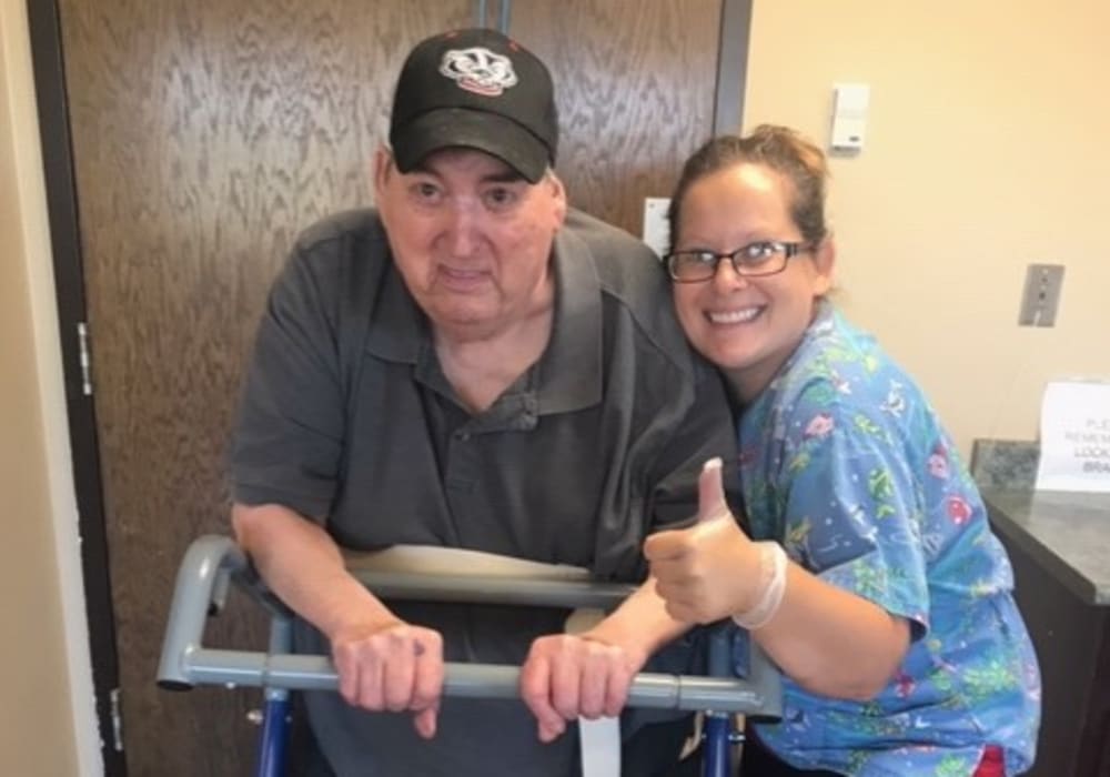 Resident and physical therapist during a session at East Troy Manor in East Troy, Wisconsin