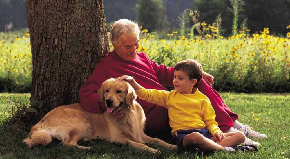 Residents with dog at Willowbrook Villa in Los Angeles, California