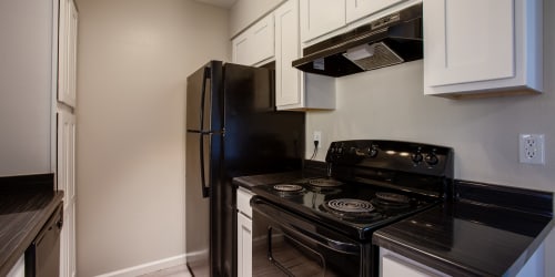 Modern kitchen with electric range at Montecito in Albuquerque, New Mexico