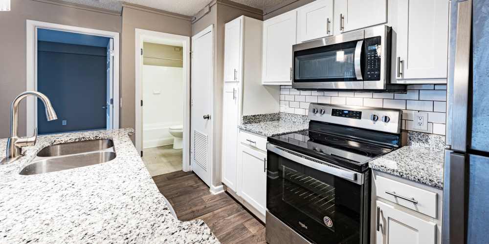 Granite countertops in an apartment kitchen at Avenue at Harbison in Columbia, South Carolina