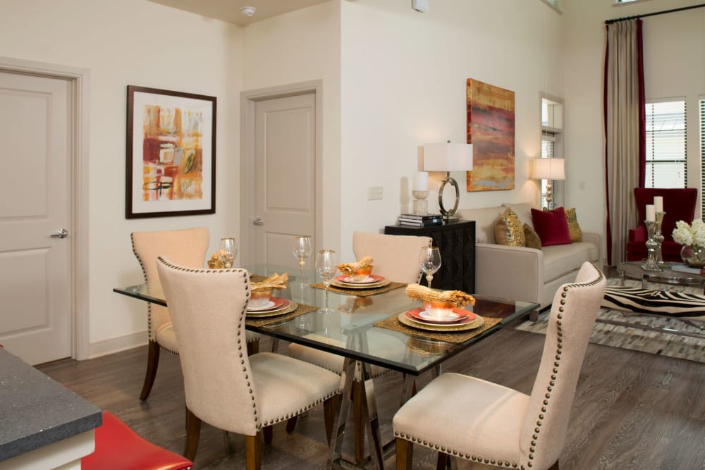 Dining area and living space at Olympus at Memorial in Houston, Texas