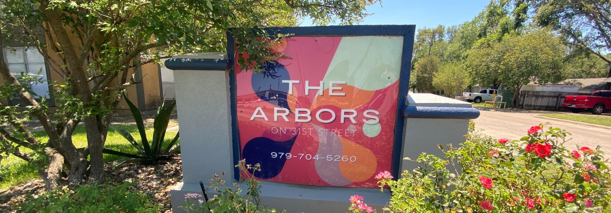 Community sign at Arbors on 31st in Bryan, Texas