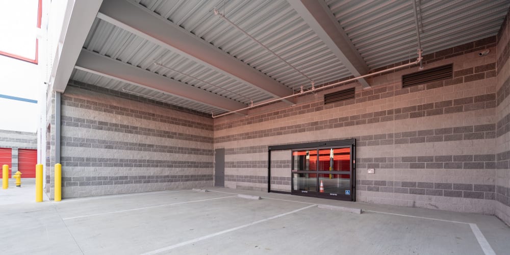 Covered parking area outside entrance to Trojan Storage of Commerce in Commerce, California