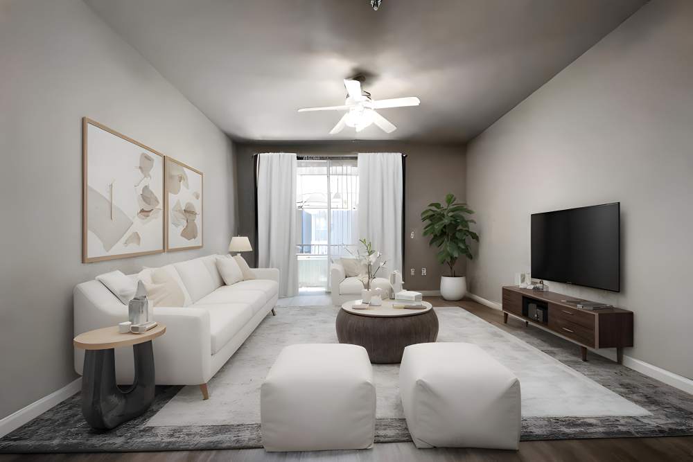 Large living room with soft carpeting at The Lofts in Sacramento, California