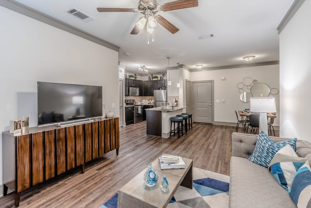 Lighted ceiling fan in living room at Sorrel Phillips Creek Ranch in Frisco, Texas