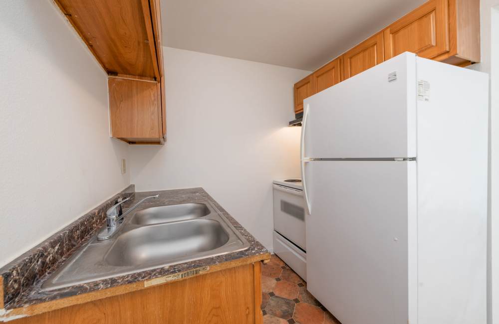 Well-designed kitchen at Twin oak apartments 