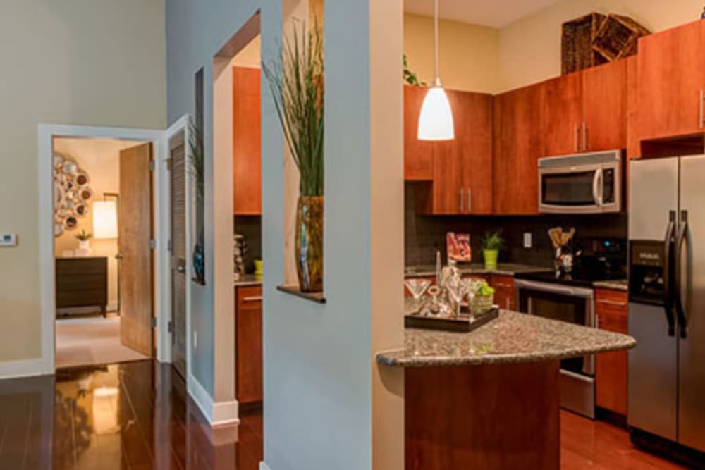 Model kitchen with granite countertops at eon at Lindbergh in Atlanta, Georgia