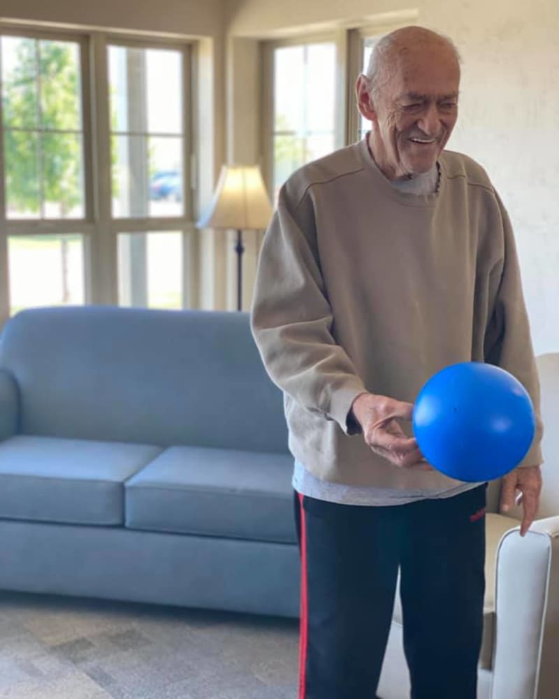 Resident bowling at Apple Creek Place in Appleton, Wisconsin