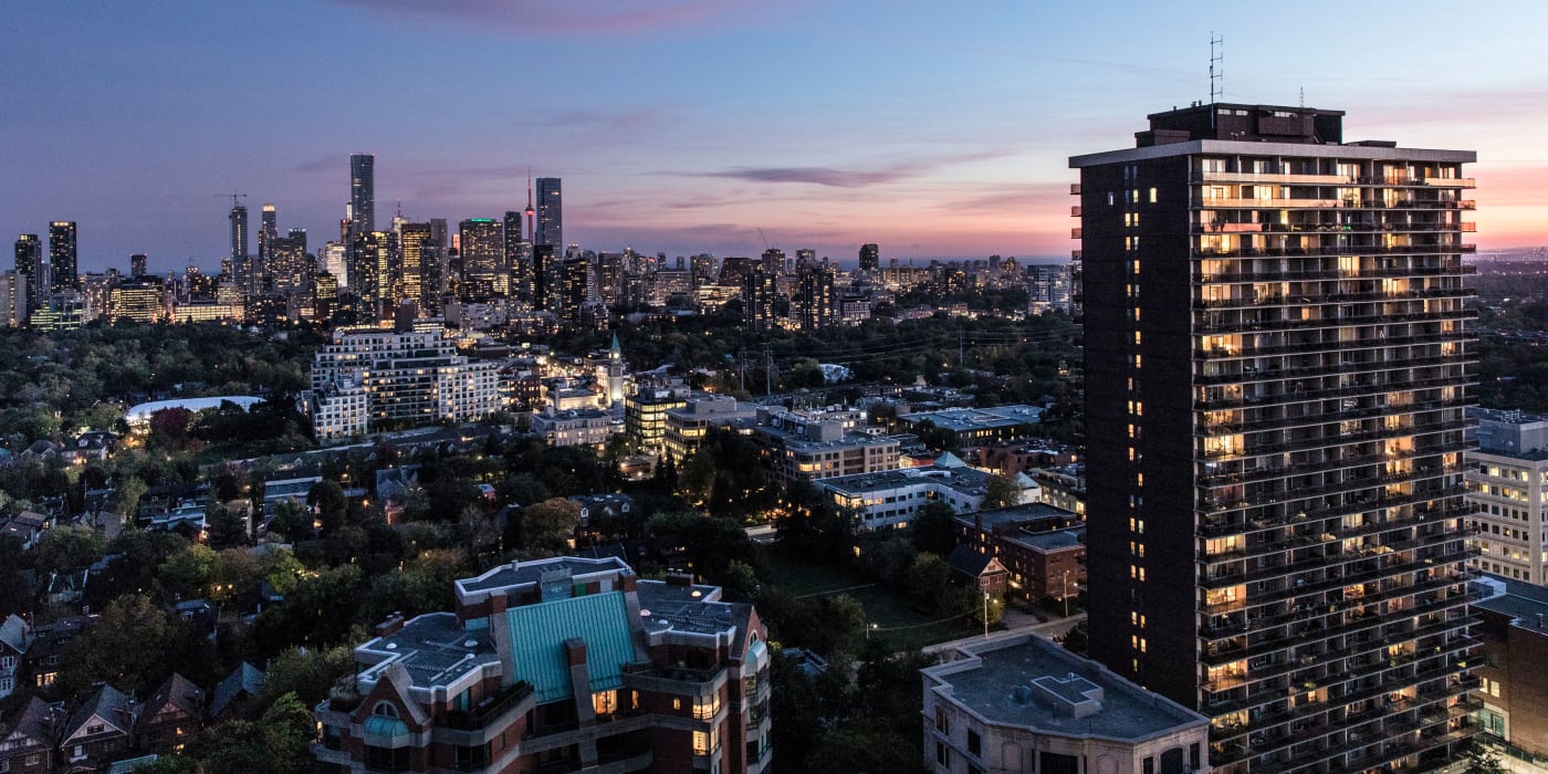 Aerial view at dusk of Bretton Place apartments