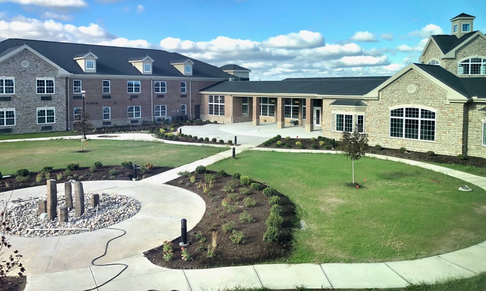 Fountain and front lawn in front of Randall Residence of Centerville in Centerville, Ohio