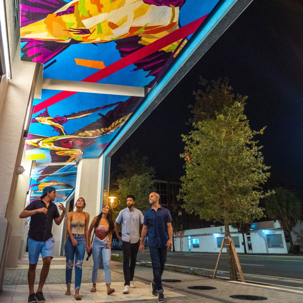 Residents walking outside at Motif in Fort Lauderdale, Florida