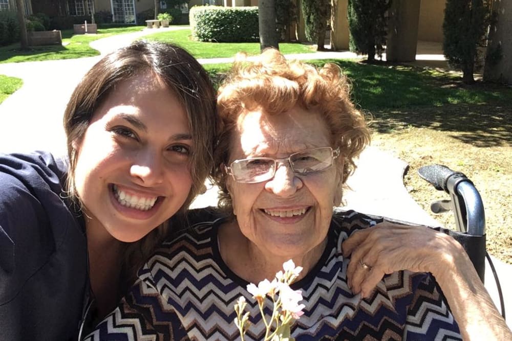 Resident taking a selfie with a caretaker at Quail Park on Cypress in Visalia, California