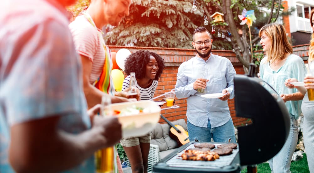 Residents grilling outdoors at Bellrock Memorial in Houston, Texas