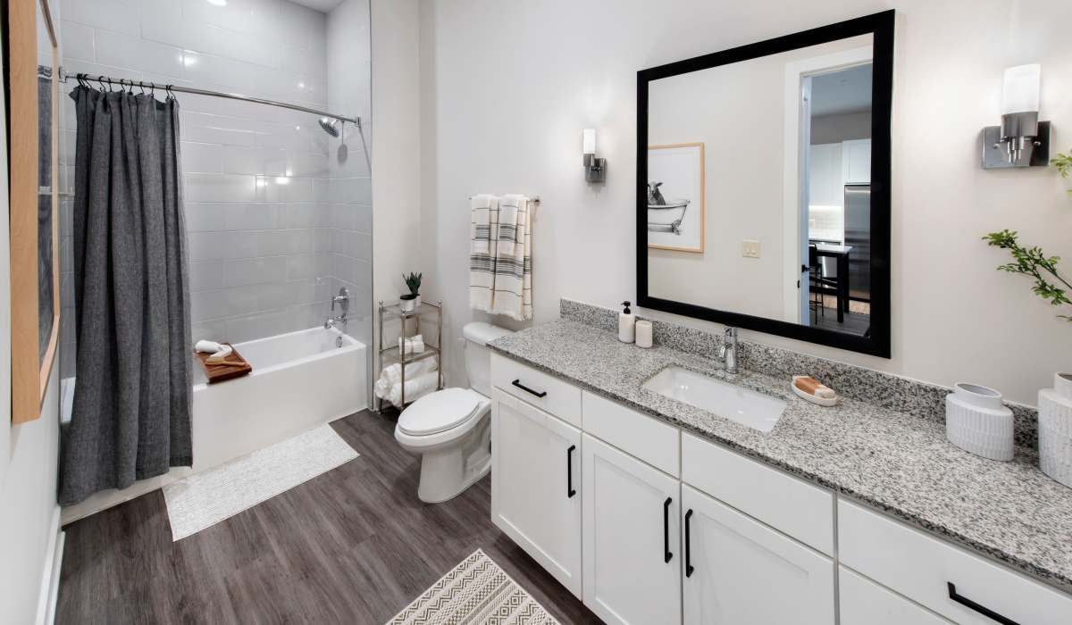 Bathroom with a bathtub at The Row at Barrett, Kennesaw, Georgia