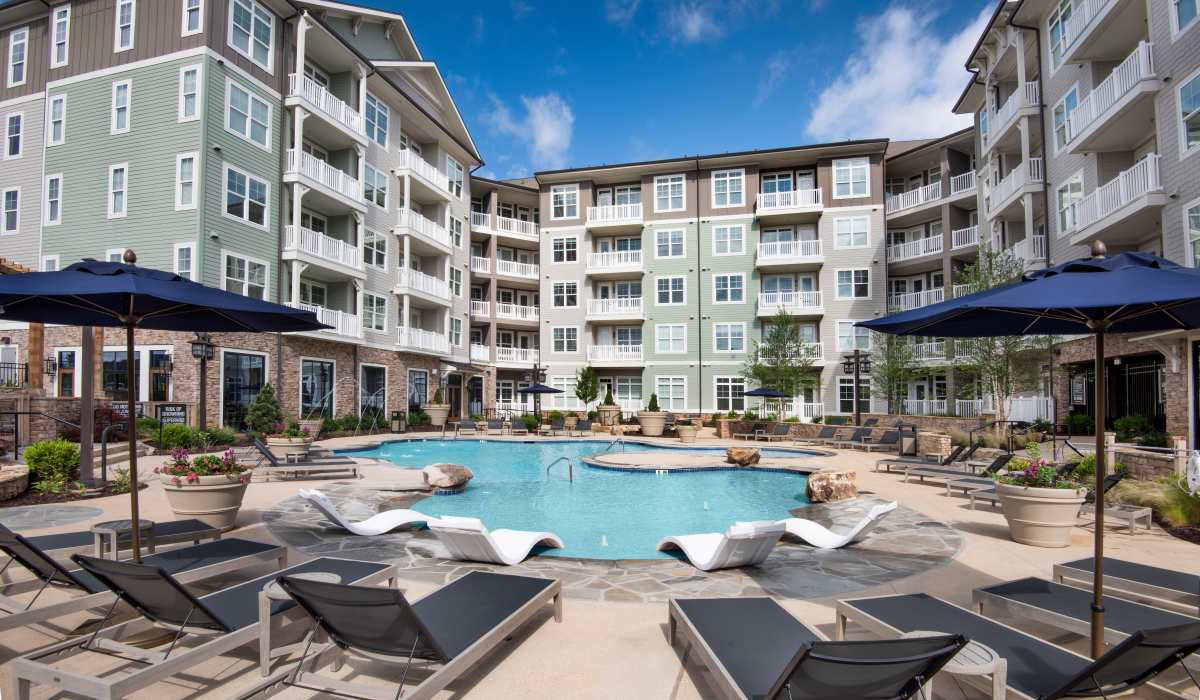 Sparkling Pool & Deck w/ Cabanas & Lounge Chairs  at The Row at Barrett, Kennesaw, Georgia