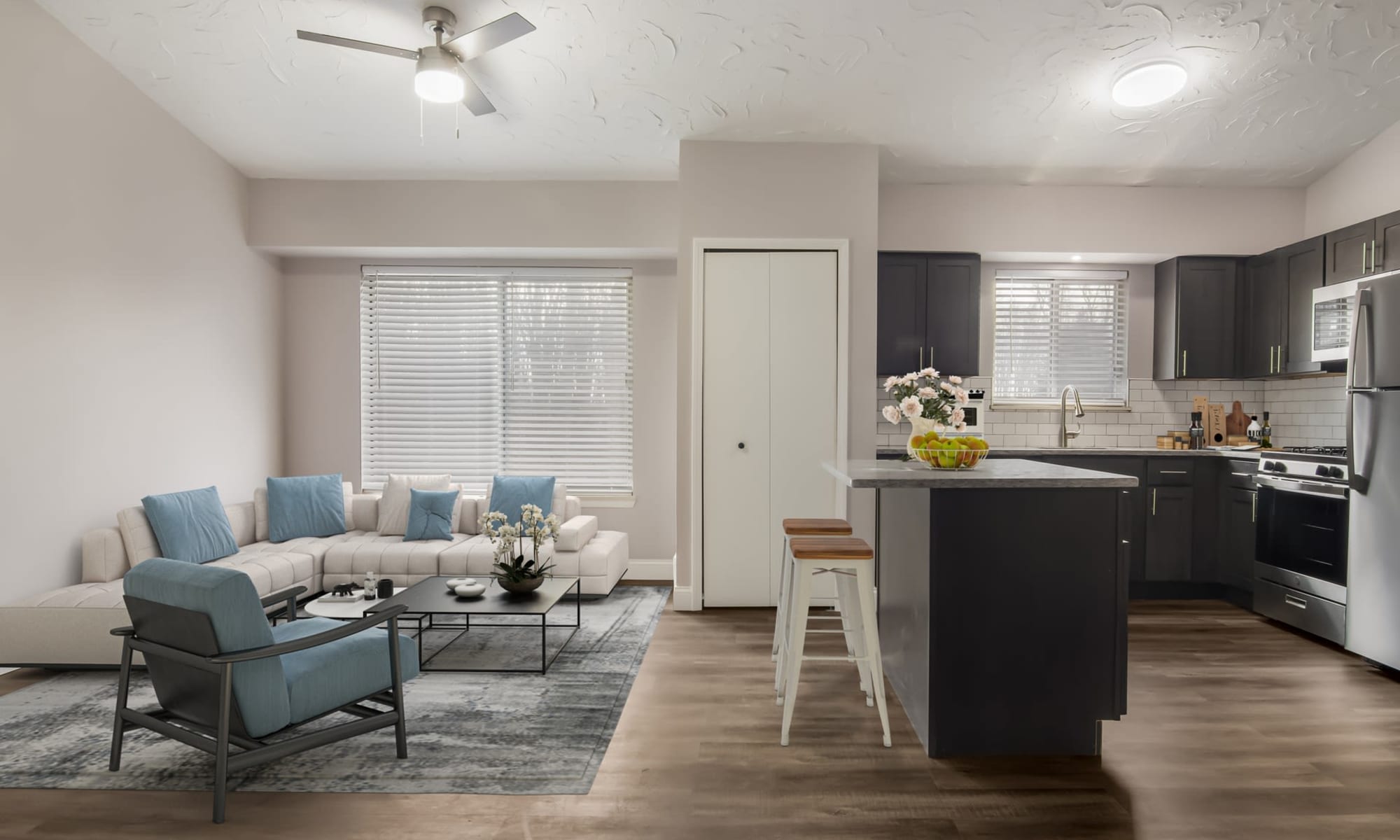 Modern living room and Kitchen at The Hamlets at Willoughby in Willoughby, Ohio