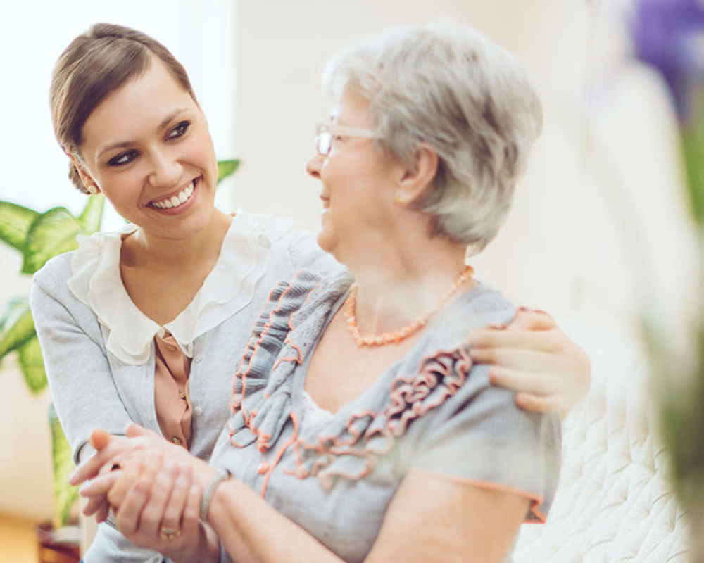 Seniors with Granddaughter at Seven Lakes Memory Care in Loveland, Colorado