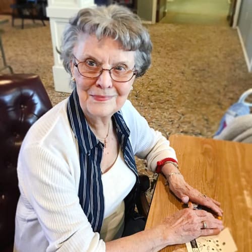 A resident playing a game at Canoe Brook Assisted Living & Memory Care in Catoosa, Oklahoma