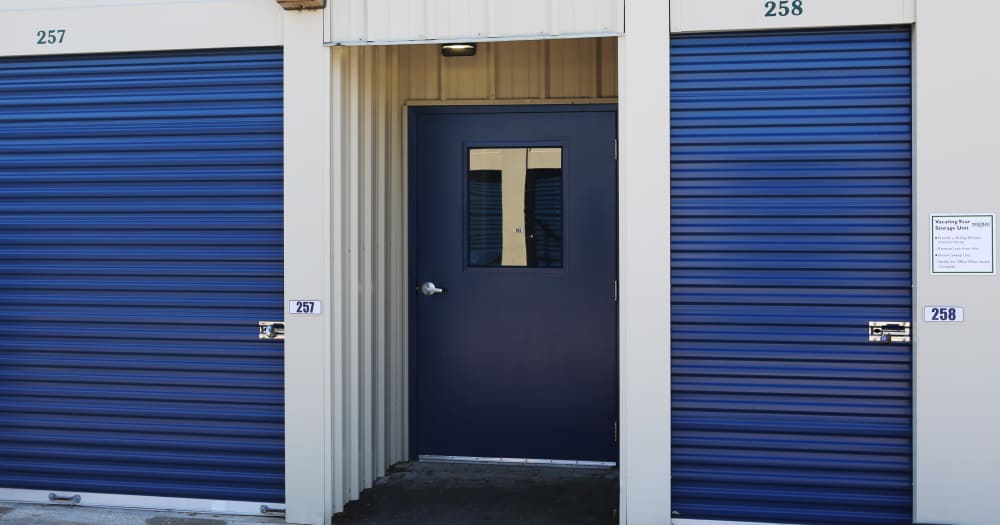 Storage units with blue doors at Midgard Self Storage in Newberry, Florida